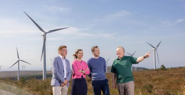 People looking at wind turbines